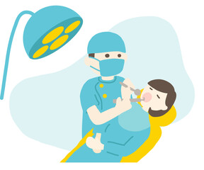 歯医者で歯の治療をする女性