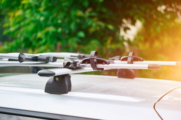 Empty roof bike carrier under sunlight