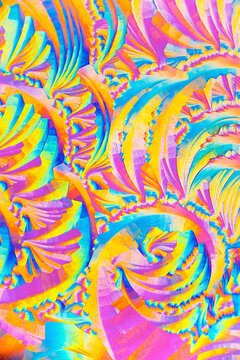 Colorful salicylic acid crystals display intricate patterns