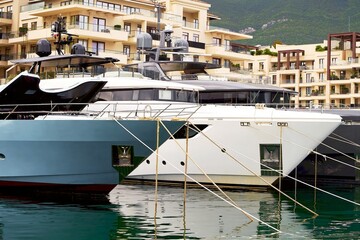 Luxury yachts moored at waterfront port