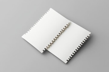 Two blank white sheets of paper, overlapping, with a wavy, tan-colored edge detail