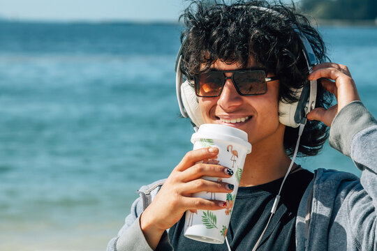 Tourist man listening music
