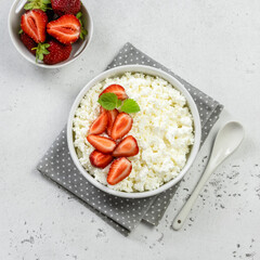 Cottage cheese breakfast bowl. Top view, copy space, flat lay.
