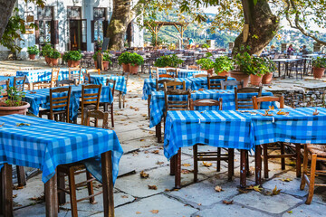 Street and cafe view at Makrinitsa village of Pelion, Greece