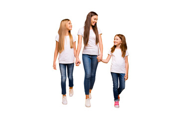 Fototapeta premium Three sister ladies holding arms spending weekend walking shopping wear casual outfit isolated yellow background