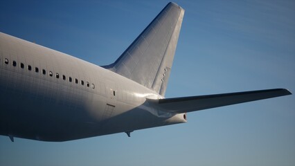 Airplane in the sky, over the cloudy sky