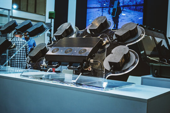 Multifrequency Phased Array Antenna System for Counter-Drone and Electronic Warfare Applications