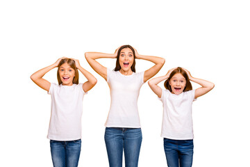 Obraz premium Photo of three sister ladies had won lottery not believe eyes wear casual white t-shirts isolated yellow background