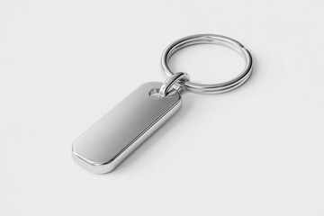 Polished metal key tag with rings.