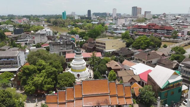 White Stupa Of Wat Ket Karam Buddhist Temple In Chiang Mai, Thailand. Aerial Drone Shot