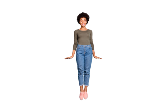 Full length photo of excited dark skin lady jumping high rejoicing with student low cost trip abroad wear casual outfit isolated pastel blue color background