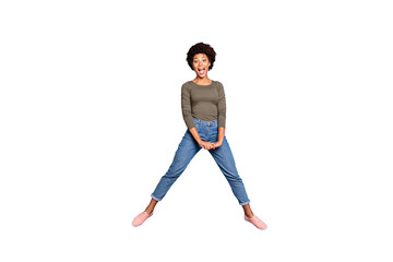 Full body photo of excited dark skin pretty lady jumping high rejoicing with student low cost trip abroad celebrating wear casual outfit isolated pastel blue color background