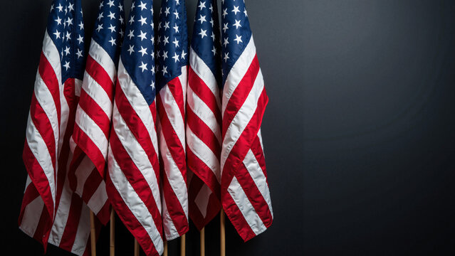 Vibrant American Flags Displayed Against a Dramatic Black Background for Independence Day Promotions and Patriotic Events