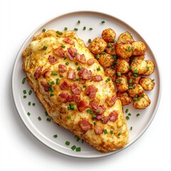 Fluffy omelette stuffed with cheese, bacon, and chives, served with a side of hash browns, isolated at white background