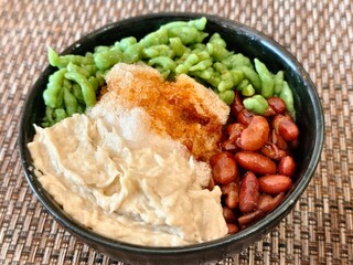 Refreshing Durian and Red Bean Cendol Ice Dessert in a Traditional Glass Bowl