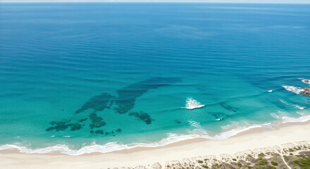 beach and wavy sea view from above photo with vivid colors.