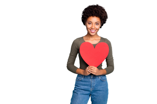 Portrait of positive cheerful afro american girl have day with her boyfriend received big red paper card valentine heart for 14-february wear green sweater denim jeans isolated blue color background