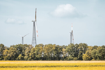 Wind Turbines with Wheat Field and Forest &ndash; Renewable Energy in Bramsche-Achmer, Germany