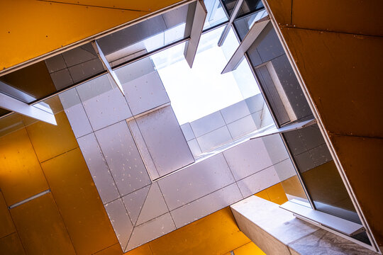 Abstract architectural design with geometric patterns, urban building details, bold lines and textures, modern minimalism, contemporary city aesthetics.