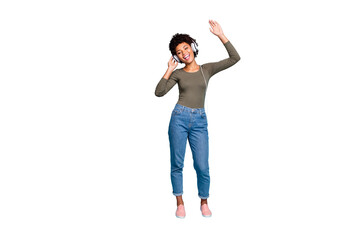 Full length photo of cheerful positive dark skin hipster girl listen music  use headset sing her...