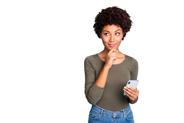 Photo of cunning smirking puzzled interested dark skinned youngster touching her chin in thought of...