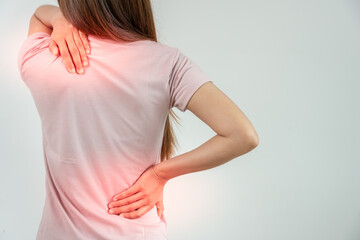 woman holding back while and suffer from unbearable pain health and problems, chronic back pain,...
