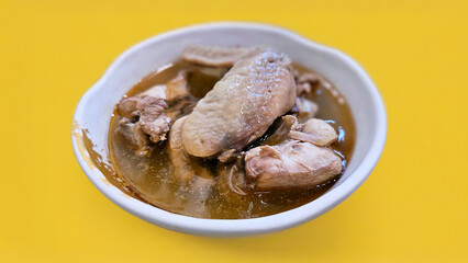 Enjoy eating traditional Chinese delicacies: sesame oil chicken and Soju wine cooked chicken soup — aromatic handmade broth simmered with bone-in chicken thigh pieces and served with dry wheat noodles