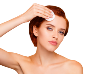 Close-up portrait of nice cute lovely sweet charming attractive calm girl removing tone cream from forehead with pad clean clear flawless skin isolated over beige background