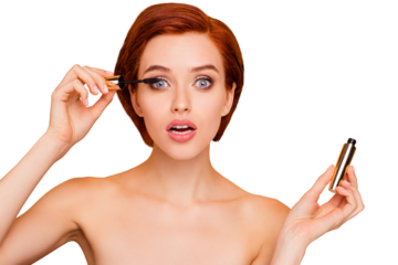 Close-up portrait of nice dreamy lovely sweet attractive glamorous positive girl holding in hands applying black mascara isolated over beige pastel background