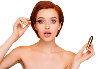 Close-up portrait of nice dreamy lovely sweet attractive glamorous positive girl holding in hands applying black mascara isolated over beige pastel background