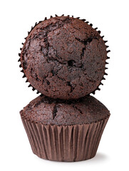 Chocolate muffins stand on each other on a white background. Isolated