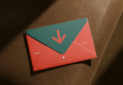 Modern Envelope Mockup &ndash; Realistic Paper Texture on Sofa Scene for Branding Display