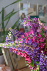 Naklejka premium Beautiful bouquet of pink and purple lupines