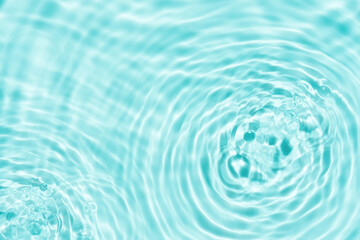 Water background,Wave circle surface on pool for Summer banner,Green water abstract pattern texture with splash drop motion and sunlight effect,Natural background for Spa, Cosmetic backdrop background