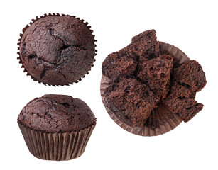 Set of chocolate muffins and broken into pieces close-up on a white. Top view