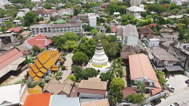 Wat Ket Karam Buddhist Temple And White Stupa In Mueang Chiang Mai District, Thailand. Aerial Drone Shot