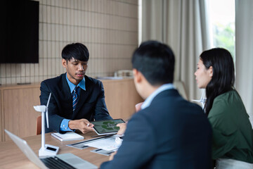 Business professionals ESG Strategy Discussion in Corporate Meeting