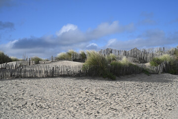 wooden protective barrier on a dune