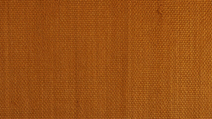 A close-up photograph of a woven textile with a uniform crosshatch pattern