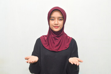 Asian girl wearing a heads carf or hijab maroon in black knit dress isolated on white background