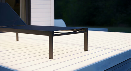 Minimalist Sunbed On Contemporary White Wooden Decking At Night