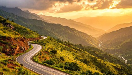 Winding Mountain Road in Rainy Season with Cloud-Covered Slopes and Wet Foliage