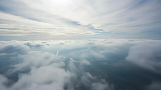 Flighting above soft clouds, revealing winding rivers, valleys, and sky blending in tranquil harmony.