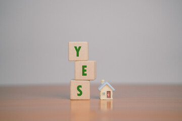 Wooden blocks show right and wrong signs, ideas, decisions, votes and yes or no. Business options...