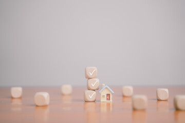 Wooden cube checklist represents success, strategy and effective task management.
When any box is...