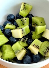 Fruit salad with kiwi, blueberry and melon