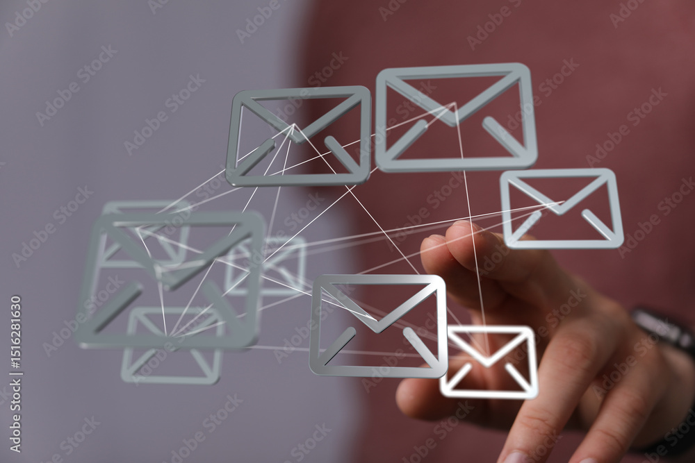 Aufkleber hand interacting with a network of email icons. digital communication concept.