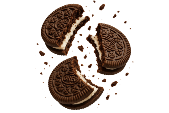 Three oreo cookies crumbling in air isolated on transparent background