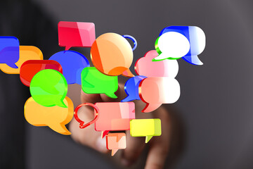 Abstract image of colorful speech bubbles, symbolizing communication, conversation, and social...