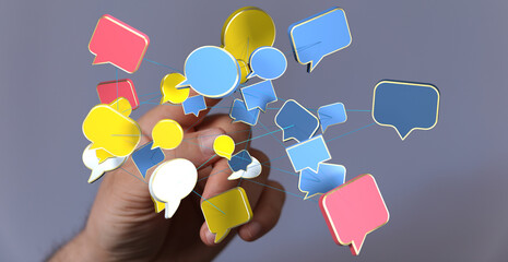 Hand interacting with a network of colorful speech bubbles, symbolizing global communication and connection.